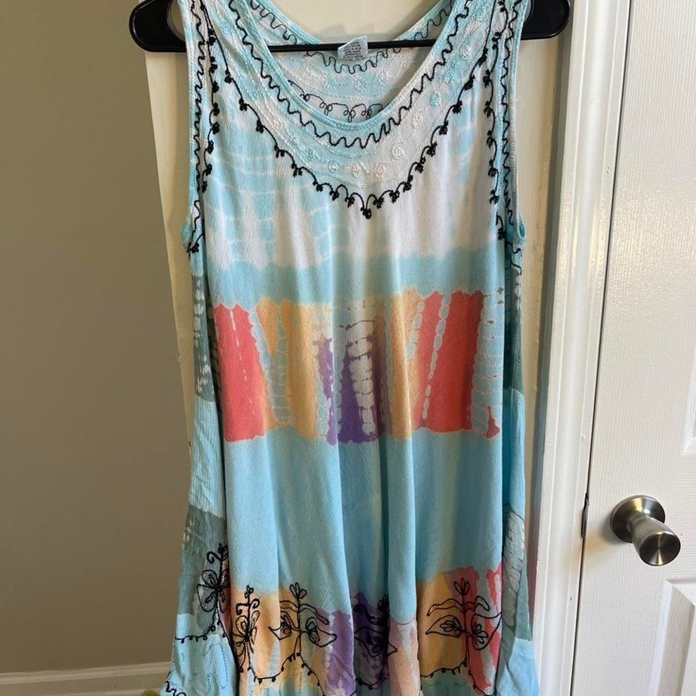 Blue and white boho beachy dress with fairy flair and embroidered details